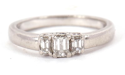 Lot 1 - A platinum and diamond ring, the three...
