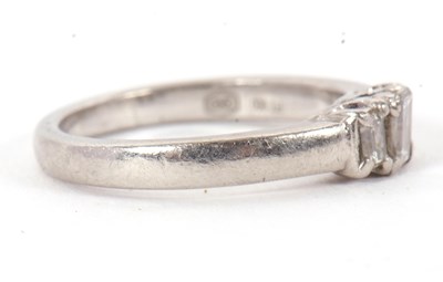 Lot 1 - A platinum and diamond ring, the three...