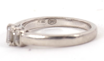 Lot 1 - A platinum and diamond ring, the three...
