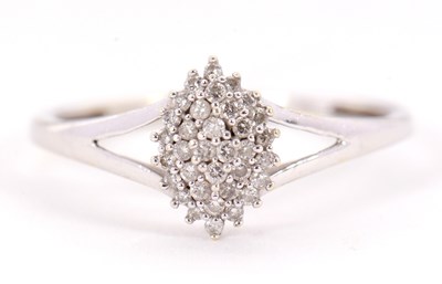 Lot 2 - A diamond cluster ring, the marquise shape...
