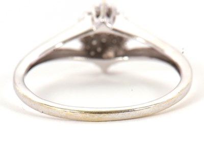 Lot 2 - A diamond cluster ring, the marquise shape...