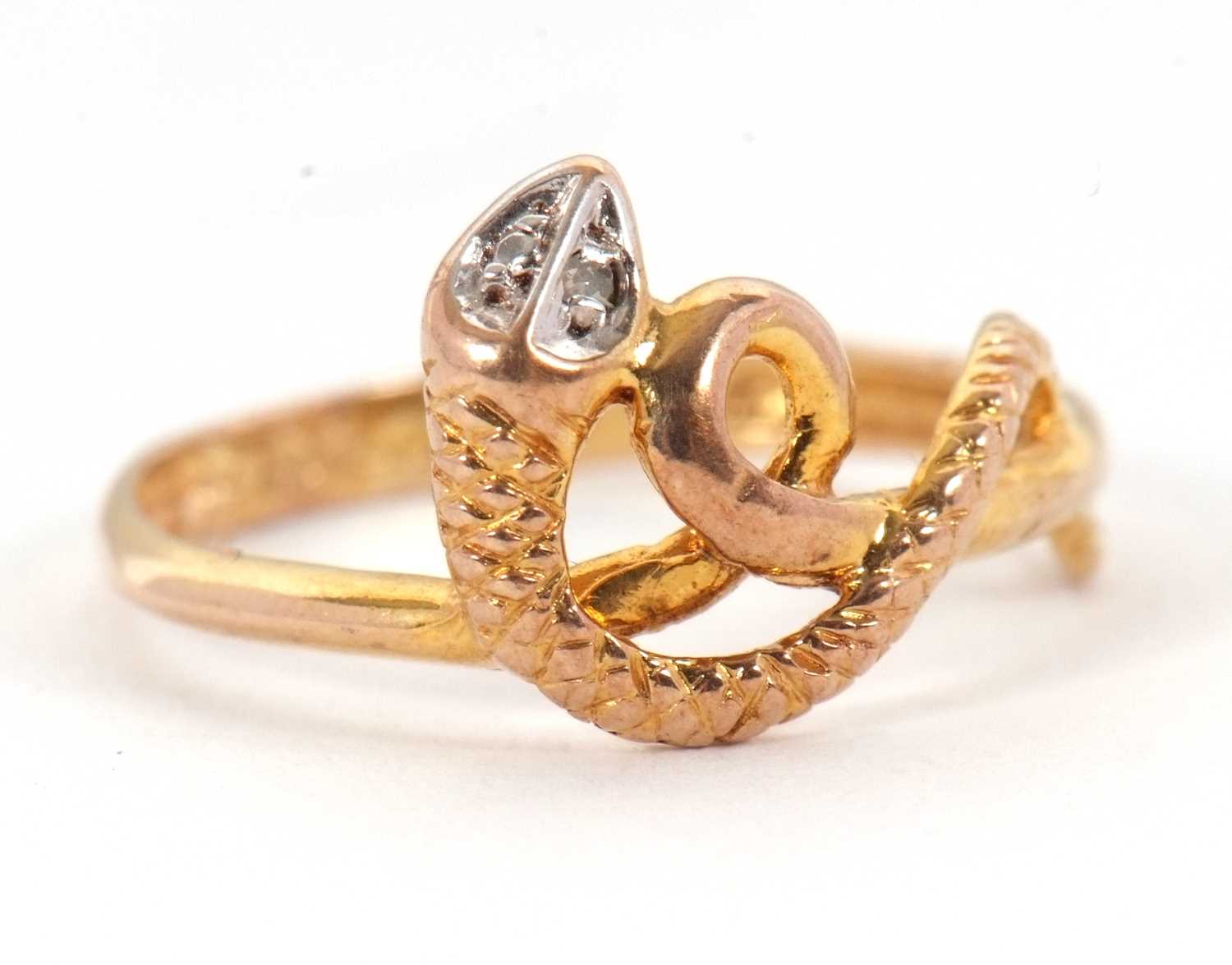 Lot 3 - A 9ct snake ring, with curled snake with a...