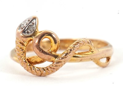 Lot 3 - A 9ct snake ring, with curled snake with a...