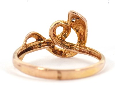 Lot 3 - A 9ct snake ring, with curled snake with a...