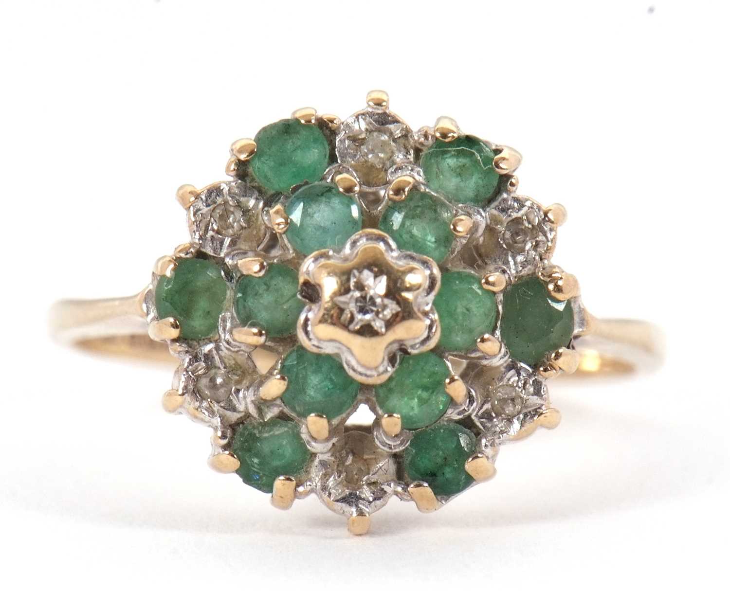 Lot 4 - A 9ct emerald and diamond cluster ring, set...