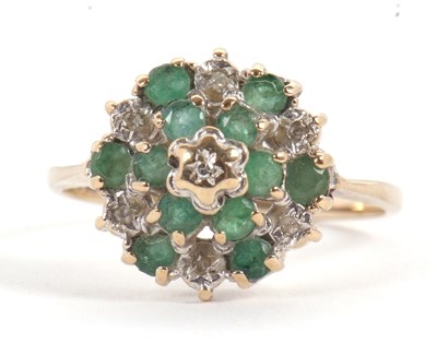 Lot 4 - A 9ct emerald and diamond cluster ring, set...