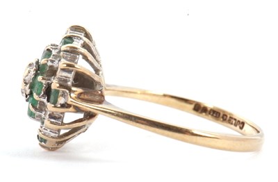 Lot 4 - A 9ct emerald and diamond cluster ring, set...
