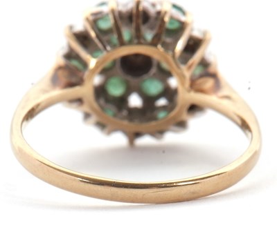Lot 4 - A 9ct emerald and diamond cluster ring, set...
