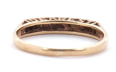 Lot 5 - A 9ct acrostic ring, the stones spelling...