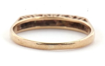 Lot 5 - A 9ct acrostic ring, the stones spelling...