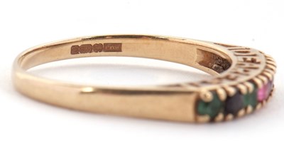 Lot 5 - A 9ct acrostic ring, the stones spelling...