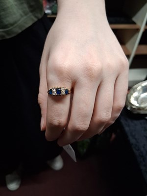 Lot 7 - An Edwardian sapphire and white stone ring,...