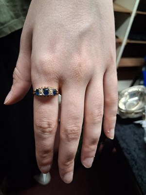 Lot 7 - An Edwardian sapphire and white stone ring,...