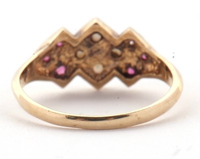 Lot 10 - A 9ct ruby and split pearl ring, the central...