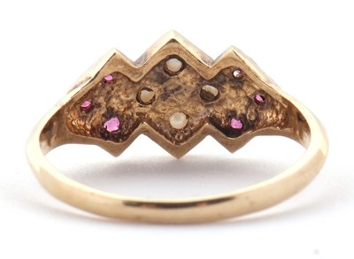Lot 10 - A 9ct ruby and split pearl ring, the central...