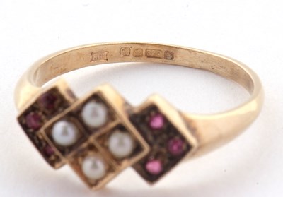 Lot 10 - A 9ct ruby and split pearl ring, the central...