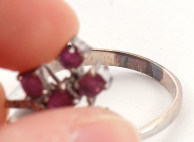 Lot 11 - A ruby and diamond ring, asymetrically set...