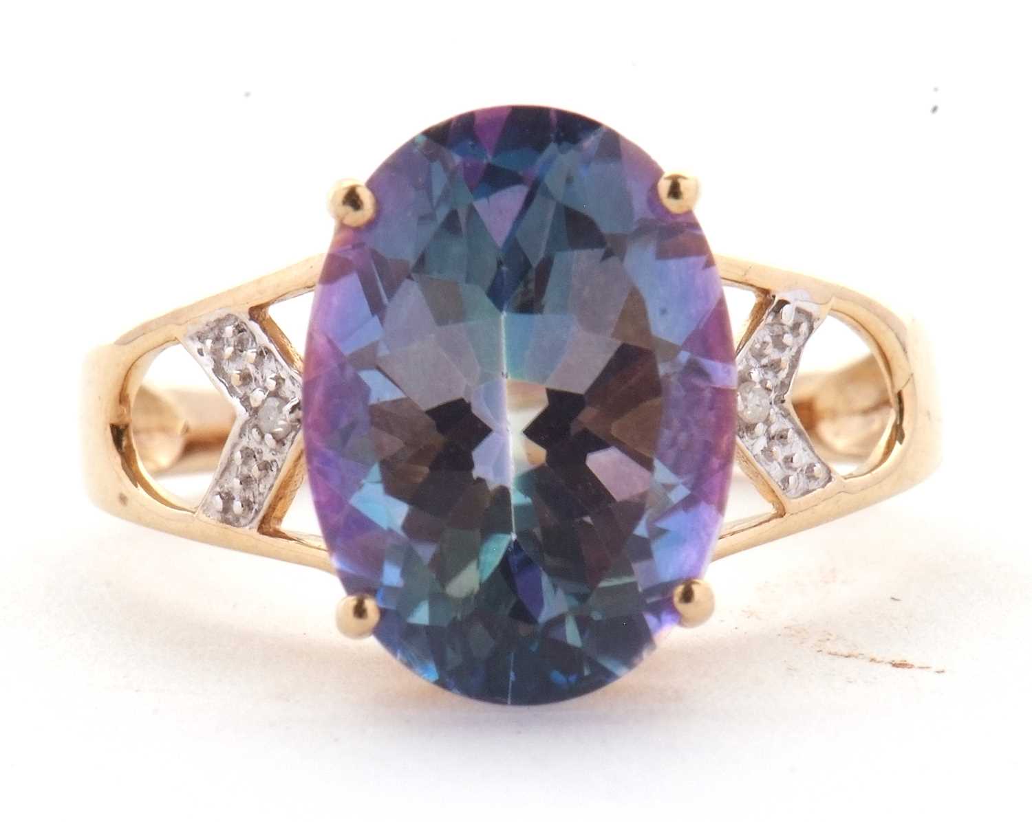 Lot 15 - A 9ct 'mystic' topaz ring, the oval 'mystic'...