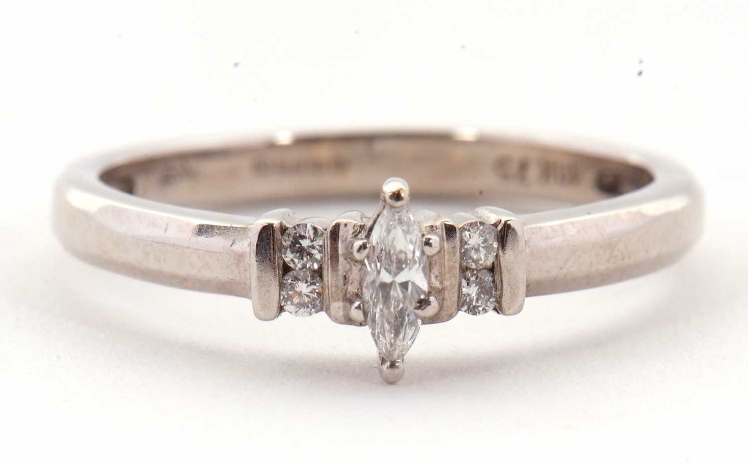 Lot 17 - An 18ct diamond ring, the central marquise...