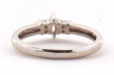 Lot 17 - An 18ct diamond ring, the central marquise...