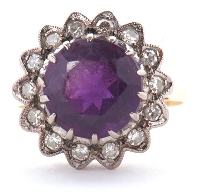 Lot 84 - An 18ct amethyst and diamond ring, the round...