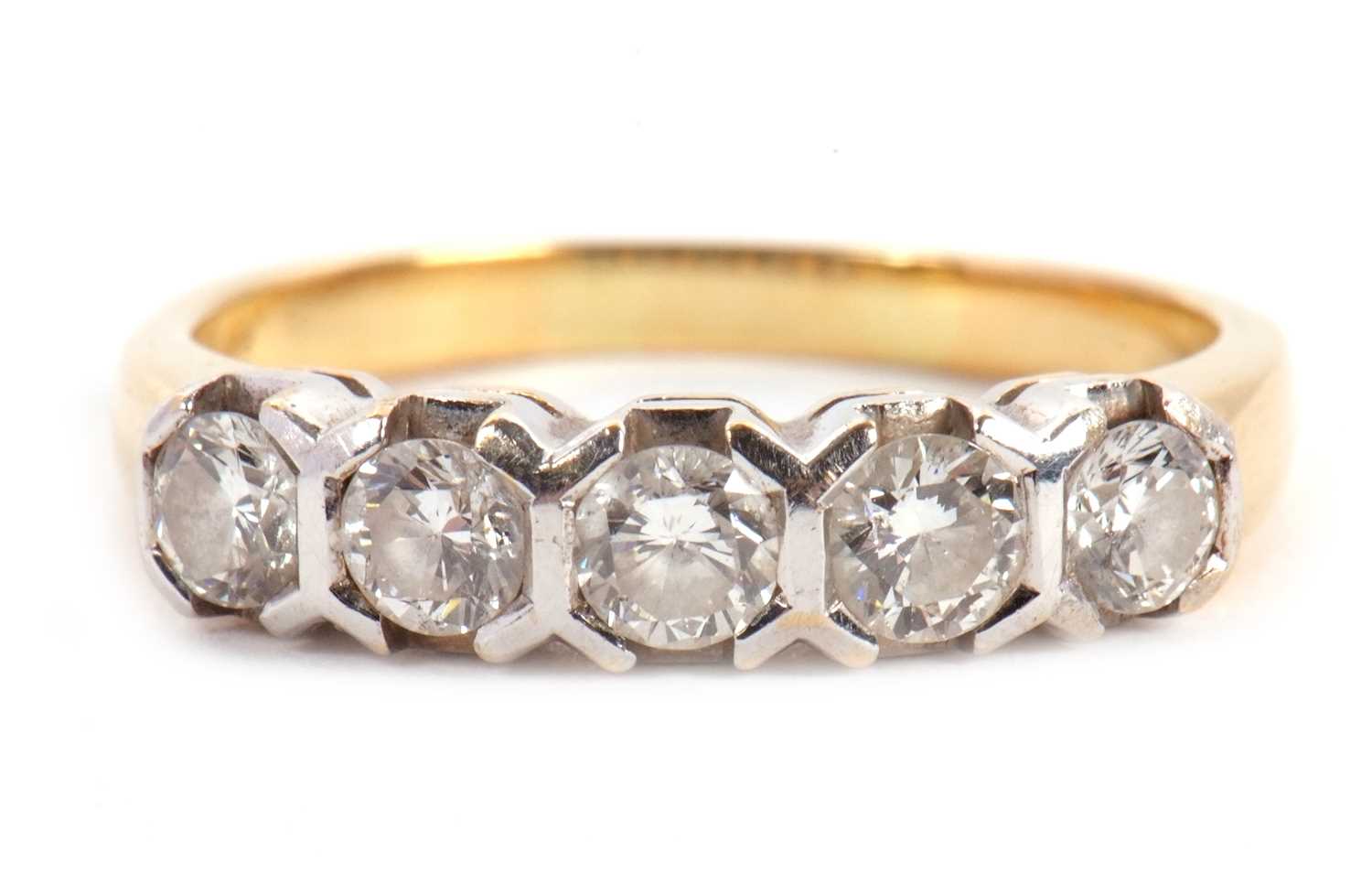 Lot 63 - A five stone diamond ring, the five round...