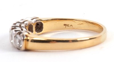 Lot 63 - A five stone diamond ring, the five round...