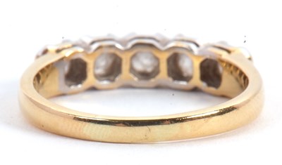 Lot 63 - A five stone diamond ring, the five round...