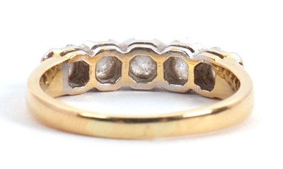 Lot 63 - A five stone diamond ring, the five round...