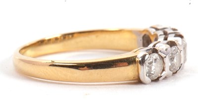 Lot 63 - A five stone diamond ring, the five round...