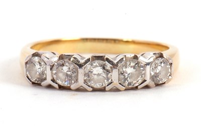 Lot 63 - A five stone diamond ring, the five round...