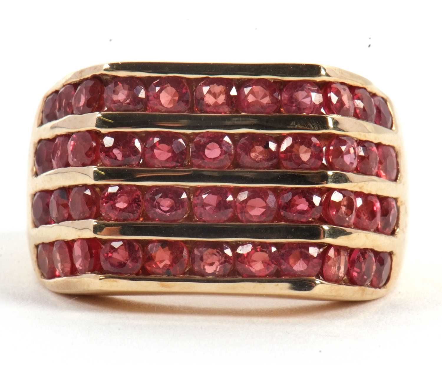 Lot 59 - A 9ct synthetic padparadscha ring, set with...