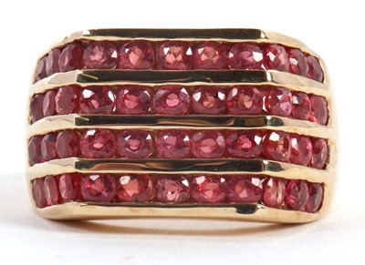 Lot 59 - A 9ct synthetic padparadscha ring, set with...