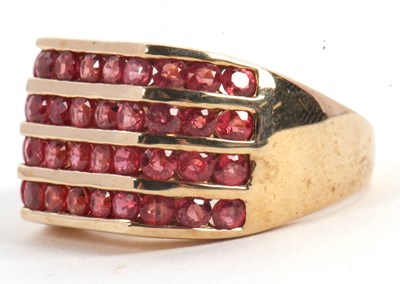 Lot 59 - A 9ct synthetic padparadscha ring, set with...