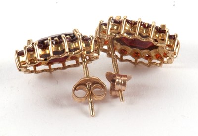 Lot 94 - A pair of 9ct garnet earrings, the oval...