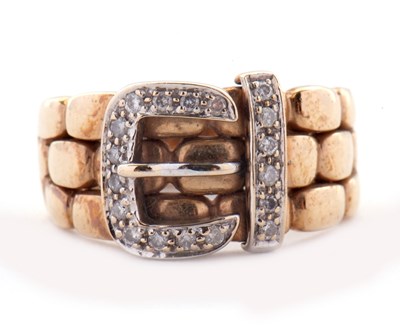 Lot 67 - A 9ct diamond buckle ring, the upper half with...