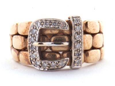 Lot 67 - A 9ct diamond buckle ring, the upper half with...