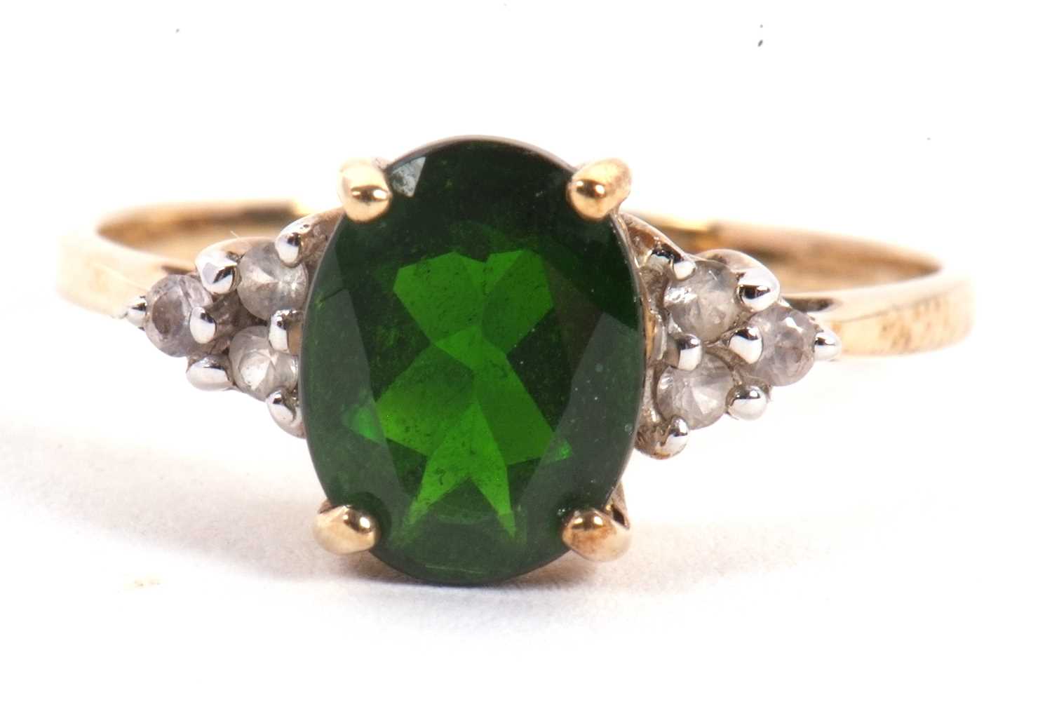 Lot 58 - A 9ct diopside and white stone ring, the...