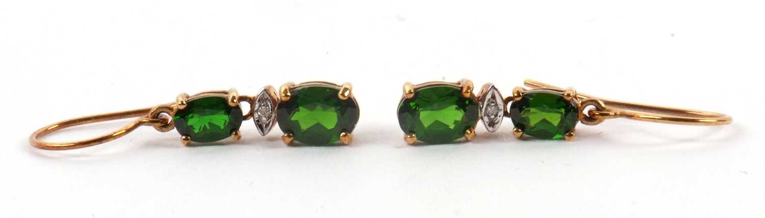 Lot 93 - A pair of diopside earrings, comprised of two...