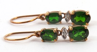 Lot 93 - A pair of diopside earrings, comprised of two...