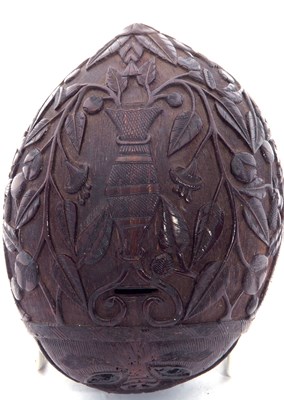Lot 379 - An unusual antique carved coconut bugbear...