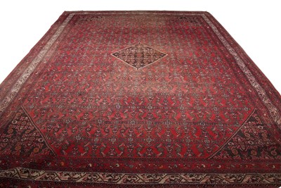 Lot 490 - Large 20th Century Caucasian wool floor rug...