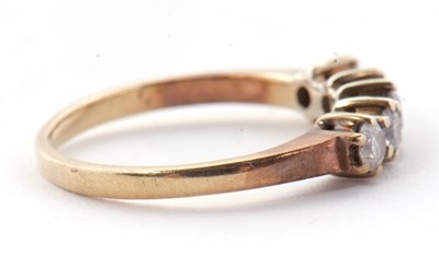 Lot 22 - A five stone diamond ring, the five round...