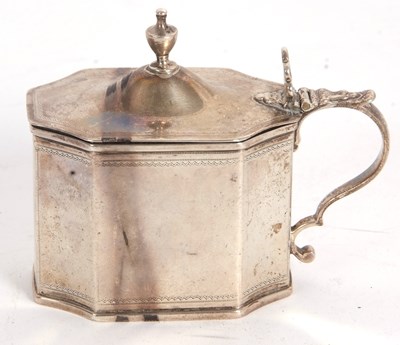 Lot 106 - A George III silver mustard pot and blue glass...