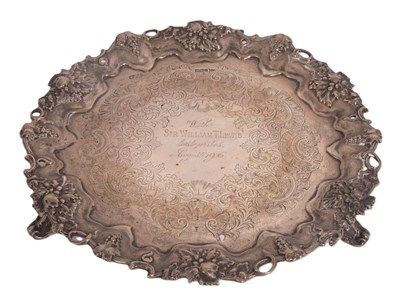 Lot 139 - An Edwardian silver salver, the centre chased...