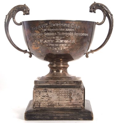 Lot 144 - A George V silver pedestal twin handle...