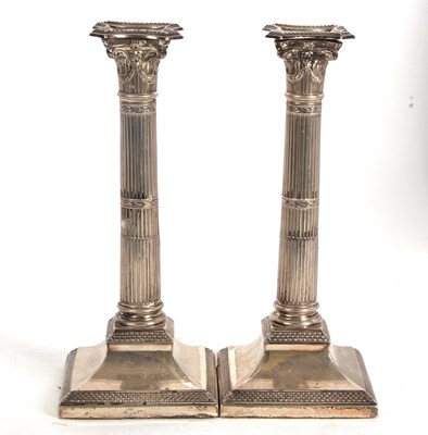 Lot 149 - A pair of early 20th Century candlesticks...