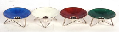 Lot 155 - Four Danish silver and enamel taper...