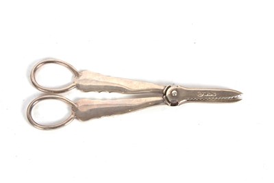 Lot 185 - A pair of George V silver grape shears in...