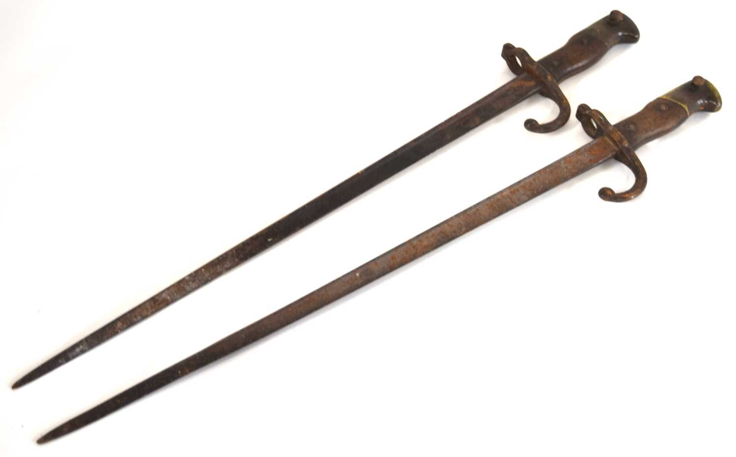 Lot 82 - Two French model 1874 Epee le gras bayonets....